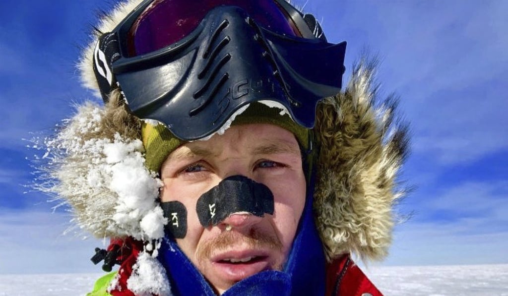 Colin O’Brady stands weather beaten mid-Antarctic. Both expeditions are incredible, but different under a technical definition. Colin O’Brady stands weather beaten mid-Antarctic. Both expeditions are incredible, but different under a technical definition.