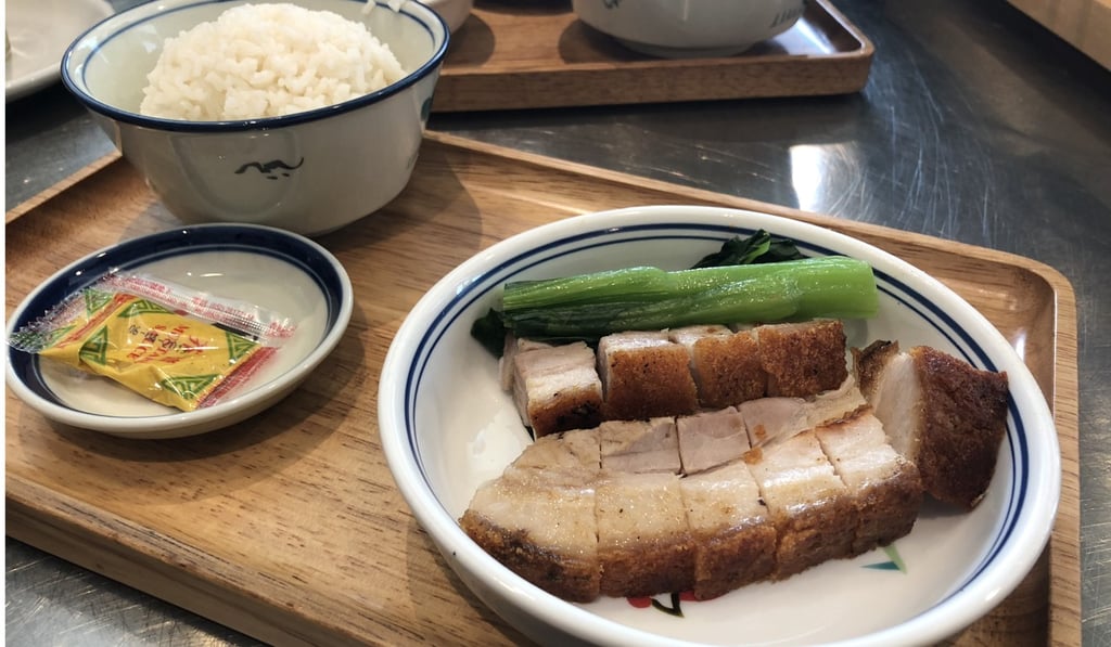 Crispy pork belly rice. Photo: Martin Choi