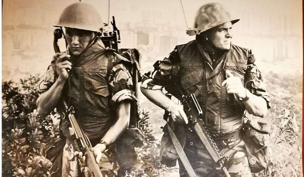 Christopher Gunns serving with the British military alongside a Gurkha soldier.