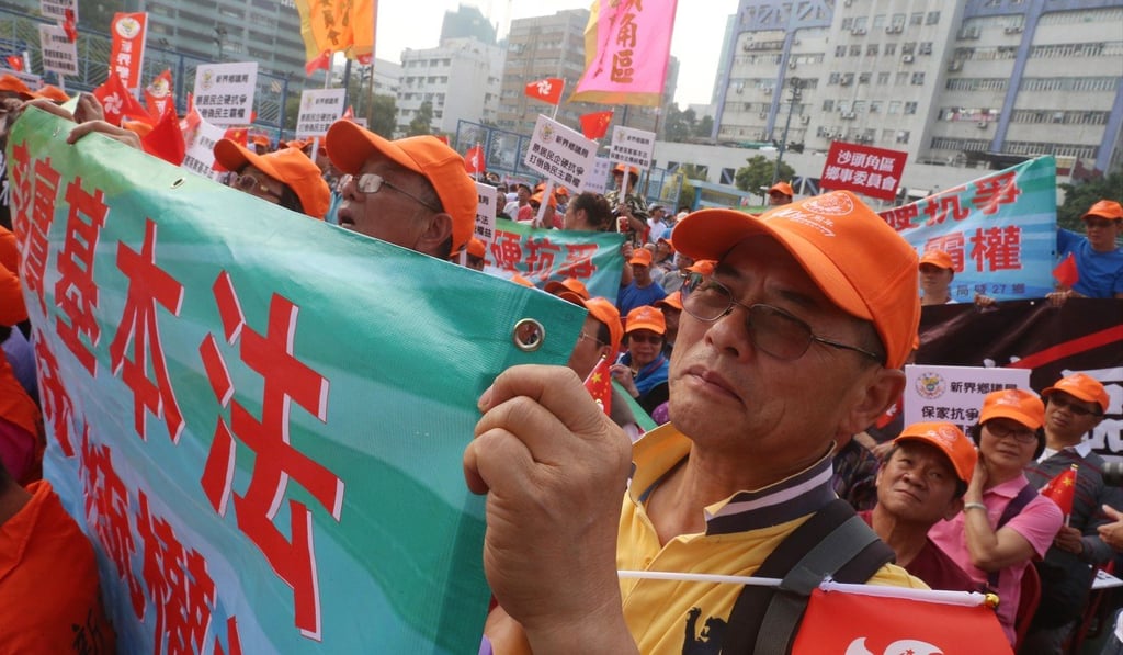 Villagers attend a Heung Yee Kuk rally to safeguard the traditional rights and New Territories’ indigenous residents.