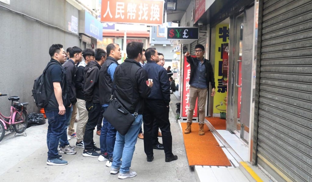 Police officers gathered outside the shop. Photo: Handout Police officers gathered outside the shop. Photo: Handout