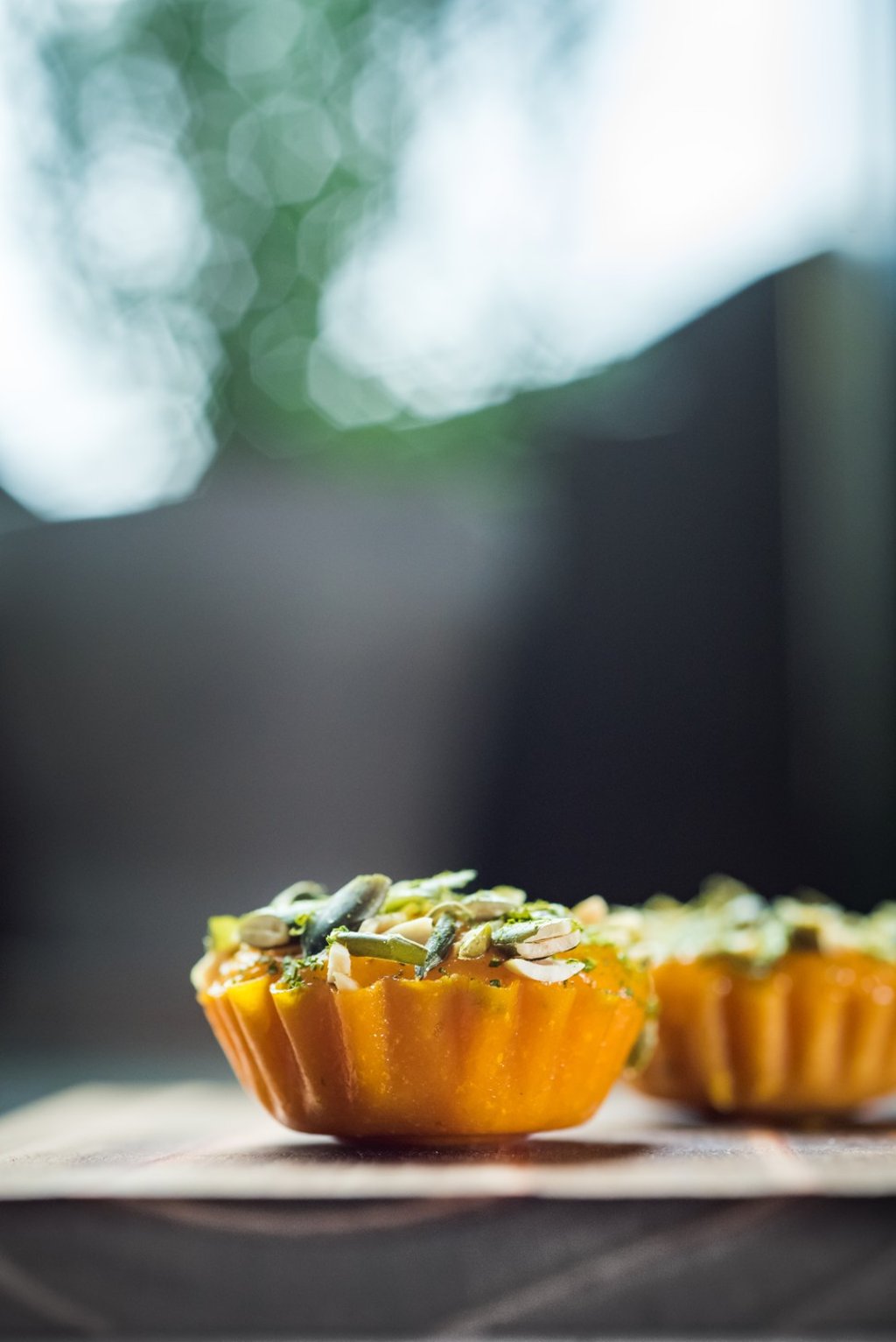 A tartlet made from preserved pumpkin filled with diced cooked pumpkin, pear and bay leaf jelly, pumpkin mousse, toasted pumpkin seeds and bay-leaf powder A tartlet made from preserved pumpkin filled with diced cooked pumpkin, pear and bay leaf jelly, pumpkin mousse, toasted pumpkin seeds and bay-leaf powder
