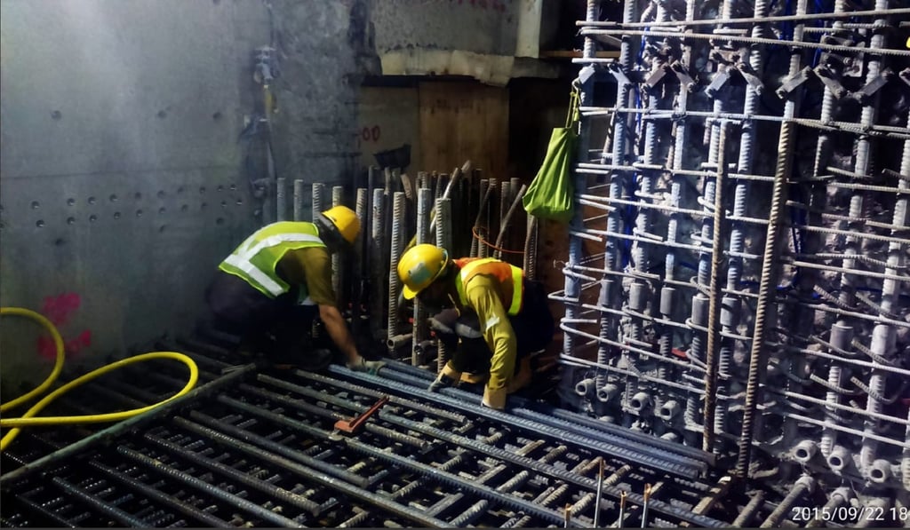 Workers in uniforms and safety helmets of Leighton Contractors (Asia), the main contractor involved in the platform scandal of Sha Tin-Central rail link, were seen cutting corners. The photos, taken on 22 September 2015, showed two workers in Leighton uniforms and helmets were cutting steel bars that formed the platform framework of the Hung Hom station for Hong Kong’s most expensive rail project. Photo: SCMP