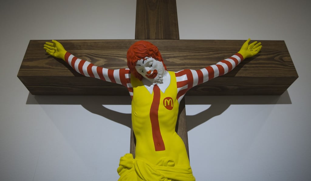 “McJesus”, sculpted by Finnish artist Jani Leinonen, is seen on display as part of the Haifa museum's “Sacred Goods” exhibit in Israel on Monday. Photo: AP