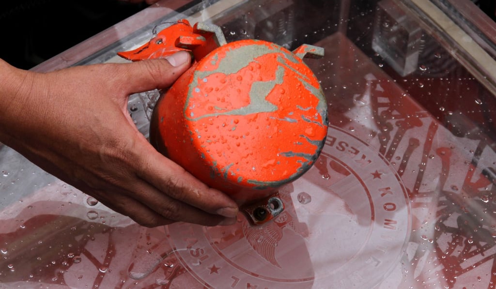 A cockpit voice recorder, the second ”black box”, from Lion Air flight 610. Photo: AFP