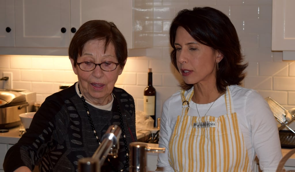 Kan with her mother in the kitchen. After her mother was diagnosed with Alzheimer’s, Kan turned to the internet, but became frustrated with the disorganised information she found. Photo: Noah Whitaker