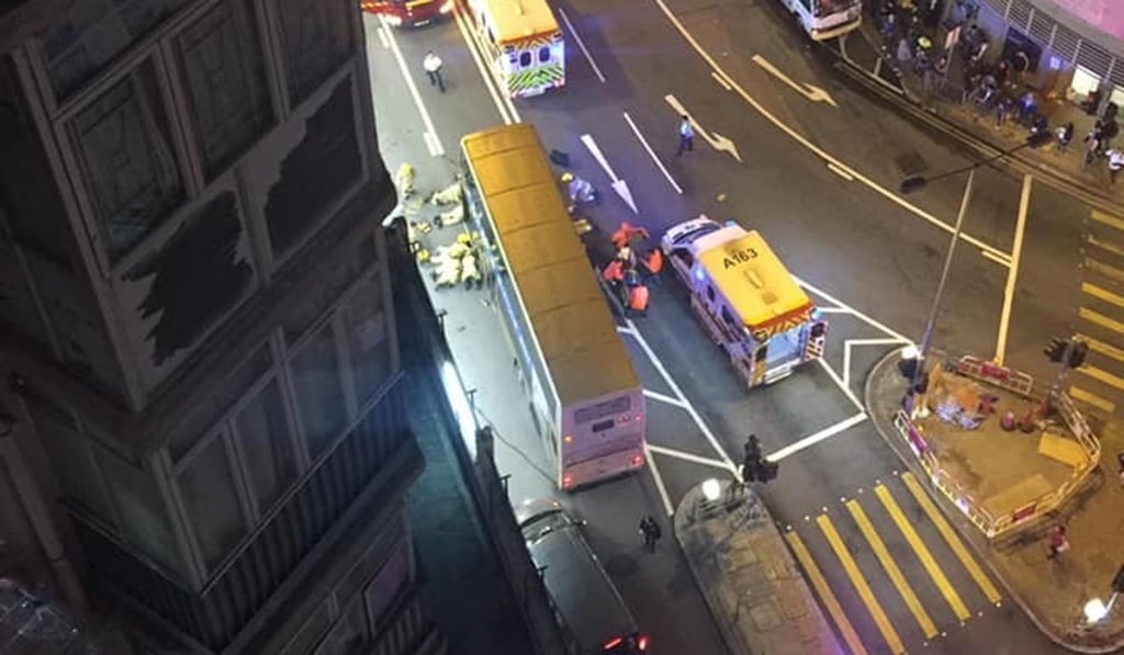 Firefighters work to free the boy from under the bus. Photo: Facebook Firefighters work to free the boy from under the bus. Photo: Facebook
