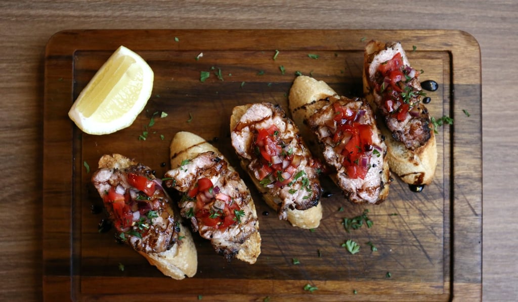 Sweetbreads on toast points with lime and tomato criolla. Photo: Jonathan Wong