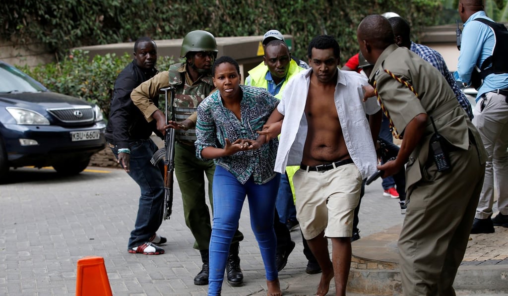 People fleeing the dusitD2 hotel compound in Nairobi, Kenya on January 15, 2019. Photo: Reuters