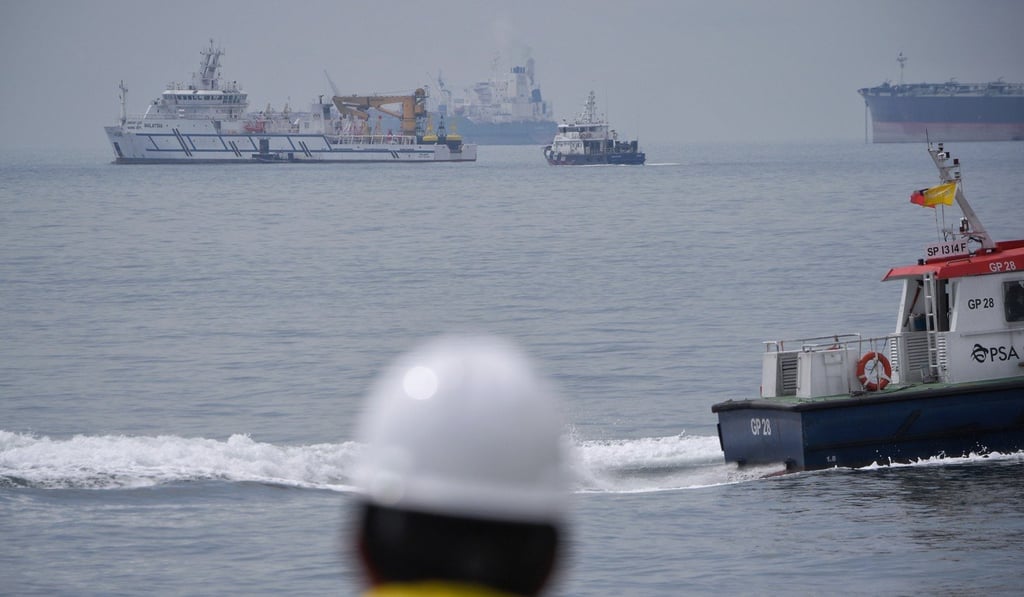 Malaysian government vessels and Singaporean coastguard vessels continue to patrol the disputed waters between the two countries. Photo: EPA