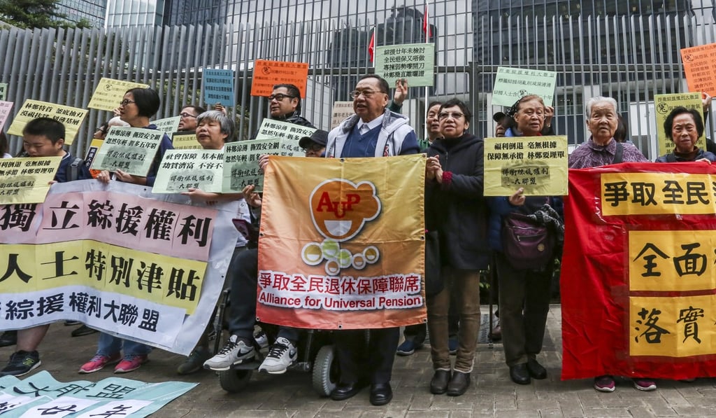 CSSA (Comprehensive Social Security Assistance) Rights Defence and a group of elderly protest against raising the age threshold for the programme at the central government offices in Tamar on Wednesday. Photo: Jonathan Wong/SCMP