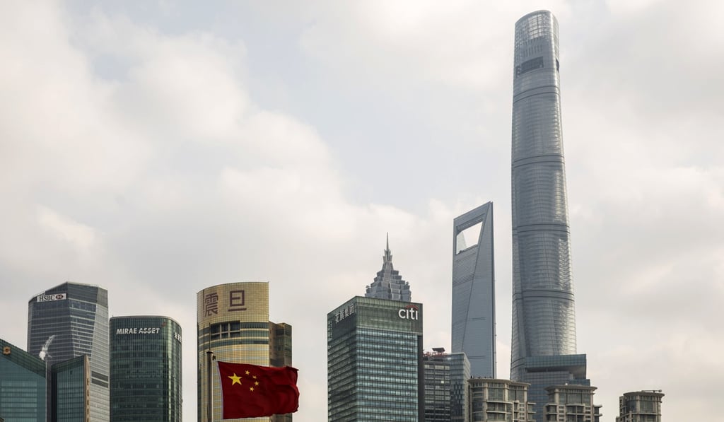 A Chinese national flag flies in front of skyscrapers of the Pudong Lujiazui Financial District stand in Shanghai, China, on December 28, 2018. Photo: Bloomberg. A Chinese national flag flies in front of skyscrapers of the Pudong Lujiazui Financial District stand in Shanghai, China, on December 28, 2018. Photo: Bloomberg.