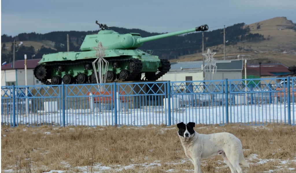A Soviet-era tank used as a second world war monument in the village of Malokurilskoye on the island of Shikotan in the Southern Kurils, Russia. Photo: Reuters