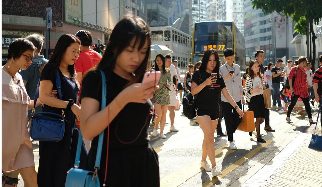 Hongkongers on average have more than two phones each. Photo: Fung Chang