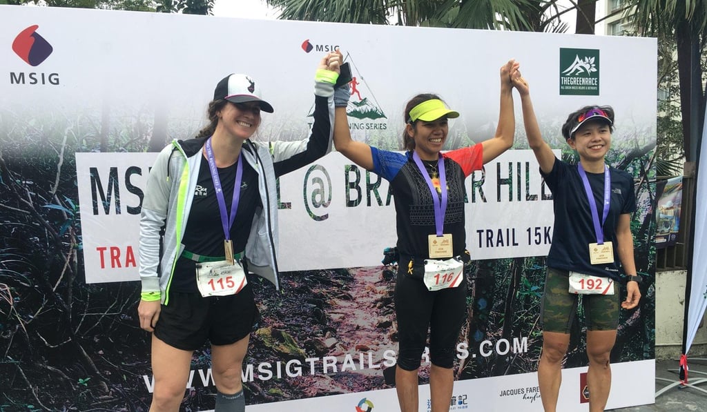 Fredelyn Alberto (Centre) wins the Breamar Green race 45km trail run, with Emily Laura Surgeon (Left) finishing second and Stephanie Leung in third.
