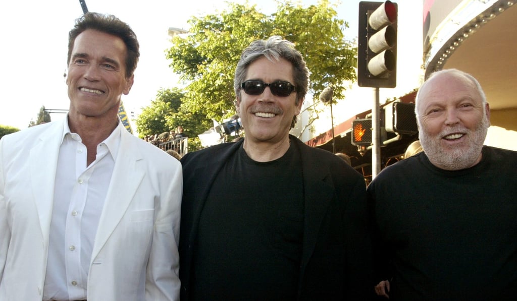 From left, Arnold Schwarzenegger posing with Mario Kassar and Vajna, the producers of “Terminator 3 Rise of the Machines,” in 2003. Photo: Reuters