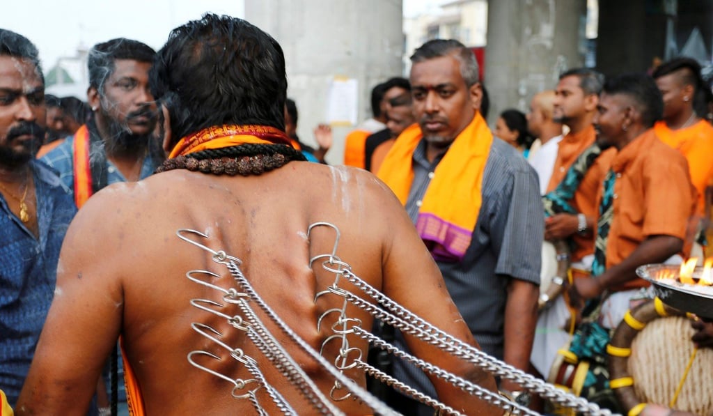 A Hindu devotee takes part in a procession during Thaipusam at Batu Caves in Kuala Lumpur, Malaysia. Photo: Reuters