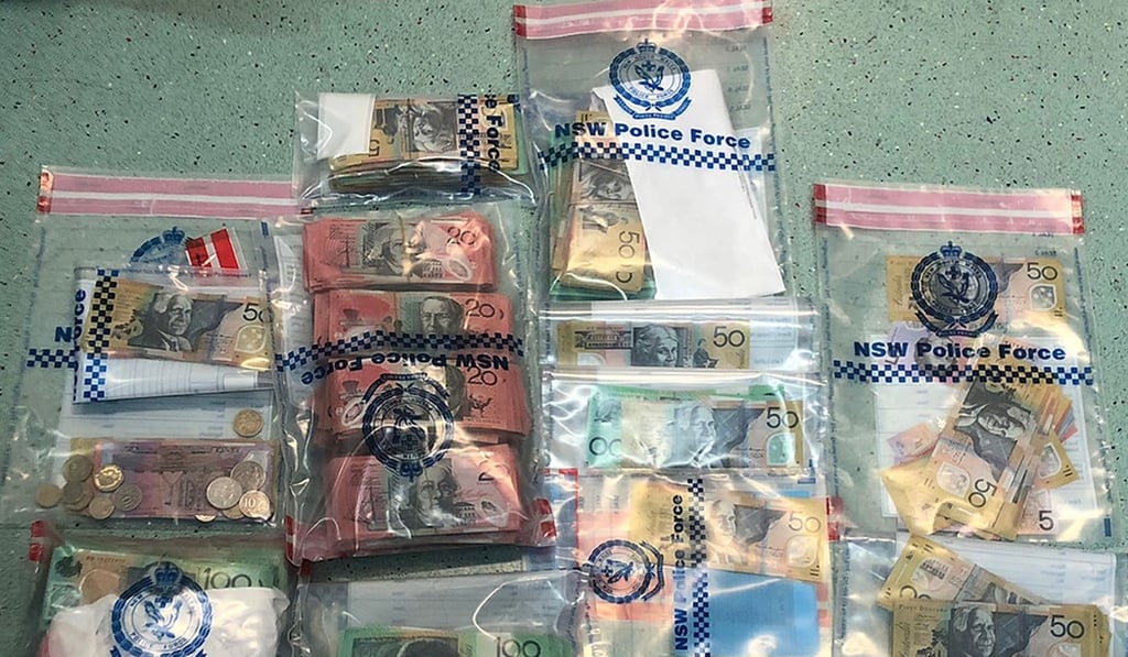 Money confiscated by New South Wales Police. Photo: Handout Money confiscated by New South Wales Police. Photo: Handout