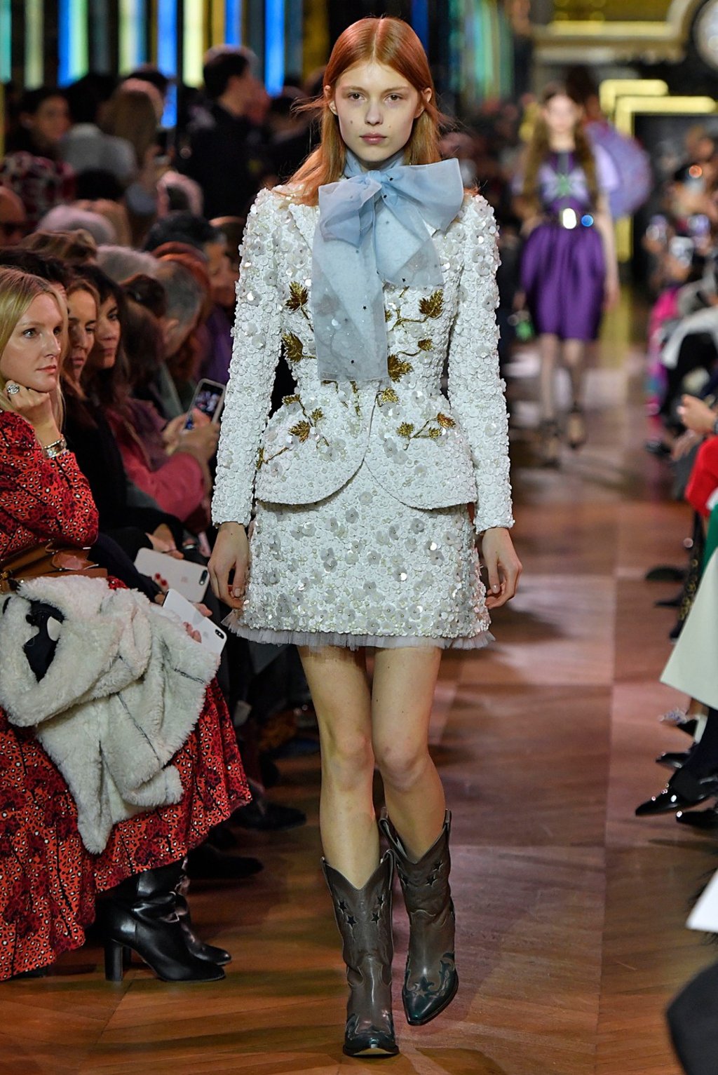 One of the glittering ensembles on the runway. Photo: Xinhua