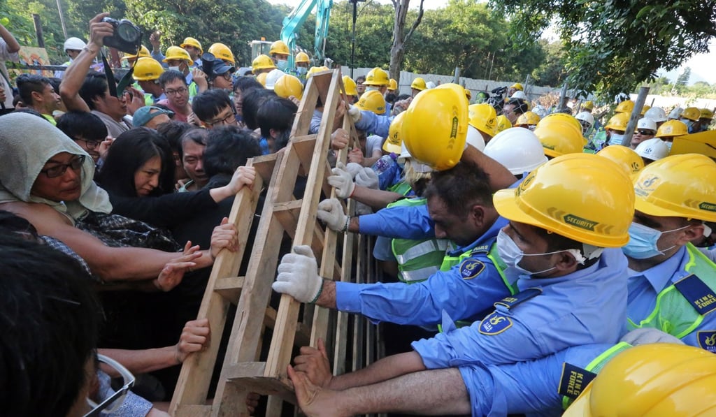 Clashes between villagers and security guards during a clearance operation at Ma Shi Po village in Fanling in June 2016. Photo: Felix Wong