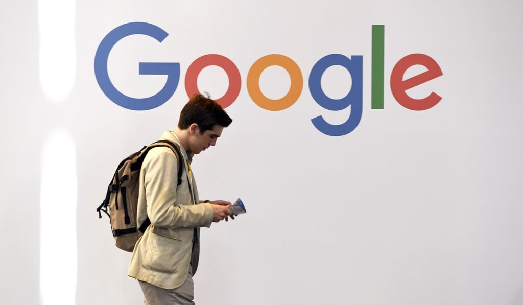 A man walks past the Google logo at the VivaTech trade fair in May, 2018 in Paris. Photo: AFP