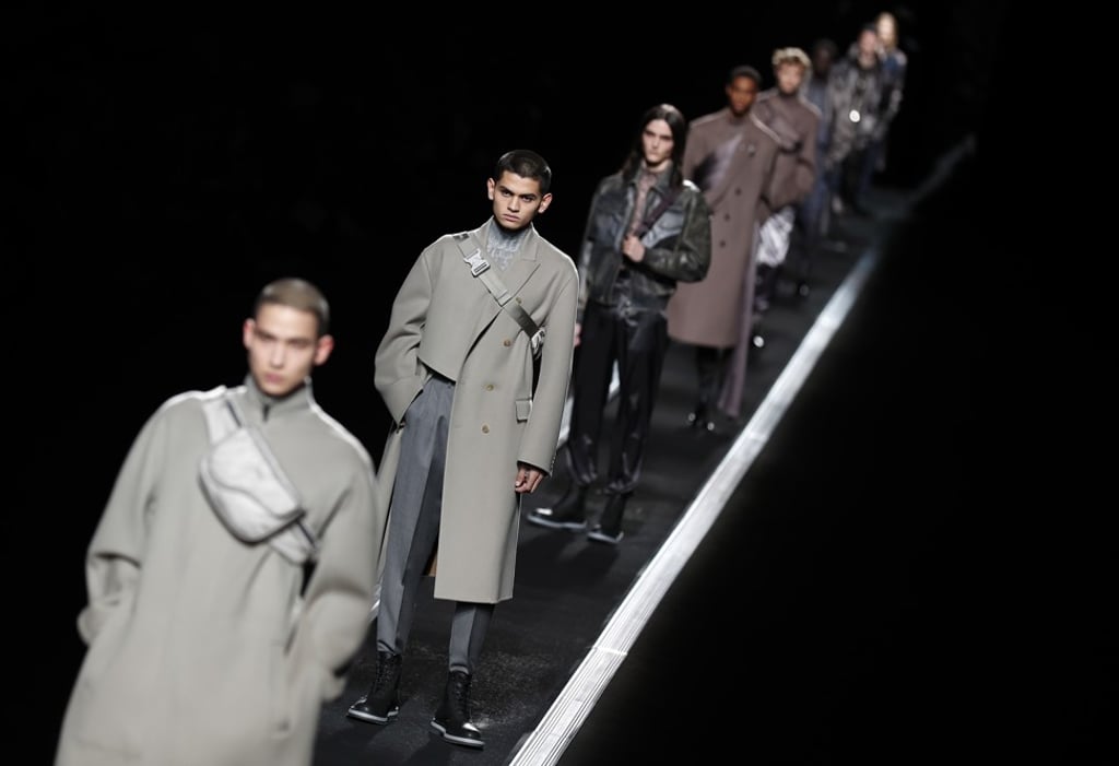 Catwalk models present Dior creations while standing still on a moving conveyor-belt catwalk during the luxury French brand’s fall/winter 2019-20 men’s collection on Friday at Paris Fashion Week. Photo: EPA-EFE