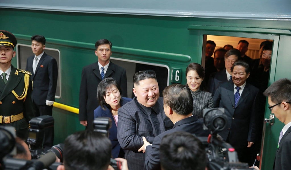 North Korean leader Kim Jong-un (middle) bids farewell to Chinese Communist Party’s International Department head Song Tao at a station in the Chinese border town of Dandong on January 9. Photo: Korean Central News Agency