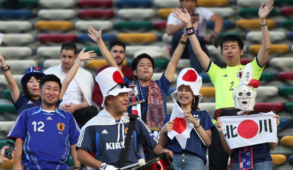 Japan fans at the match against Oman. Photo: EPA Japan fans at the match against Oman. Photo: EPA