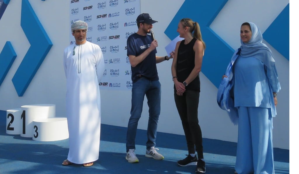 Eoin Flynn works in Oman as the Muscat Marathon finish line announcer, a job he came to through the UTMB. Photo: Pavel Toropov