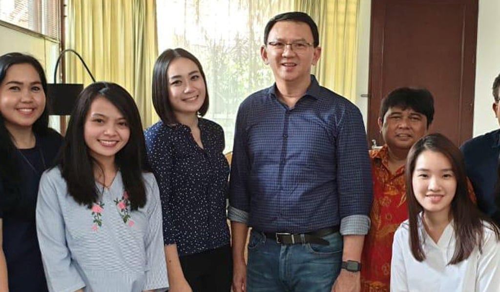 Former Jakarta governor Basuki “Ahok” Tjahaja Purnama with his girlfriend (to his right) and relatives after being released from prison. Photo: Reuters