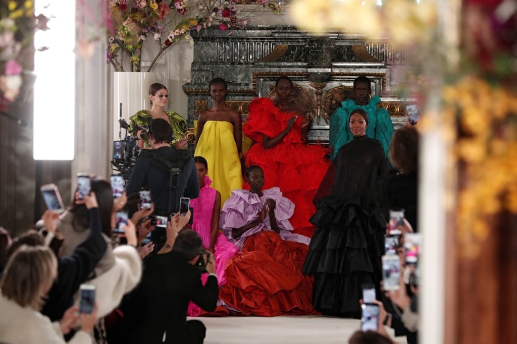 Model Naomi Campbell stands with models at the end of Italian designer Pierpaolo Piccioli’s spring/summer 2019 collection show for Valentino in Paris. Photo: Reuters