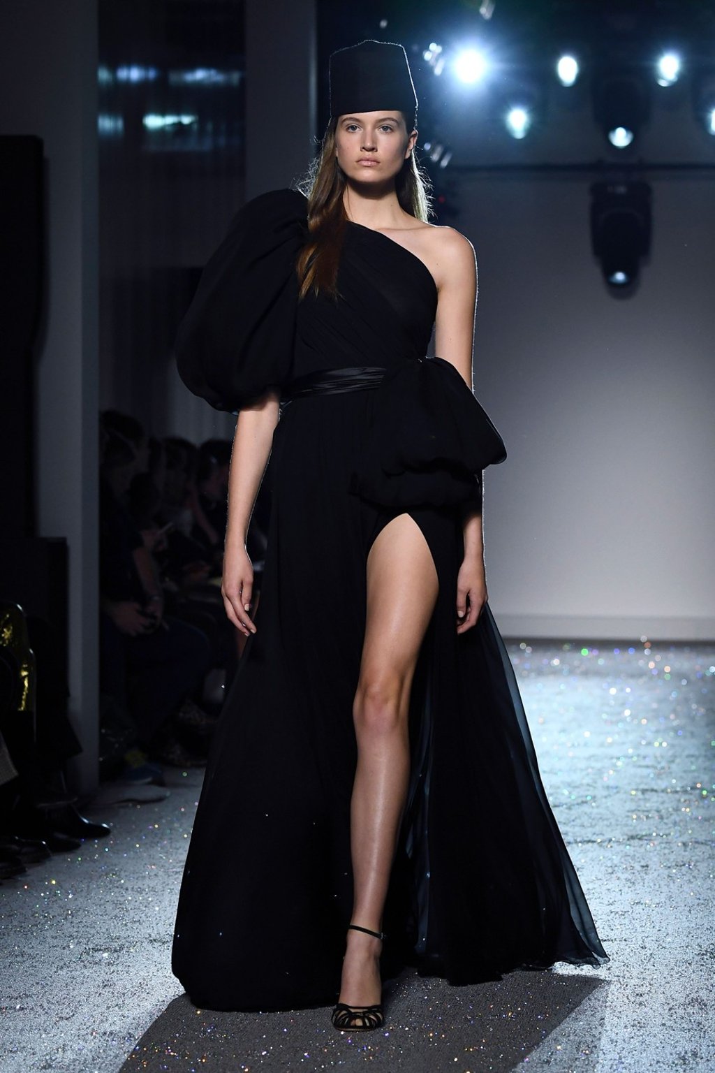 A model presents a black off-the-shoulder dress by Giambattista Valli during the 2019 spring/summer haute couture collection show in Paris on Monday. Photo: AFP