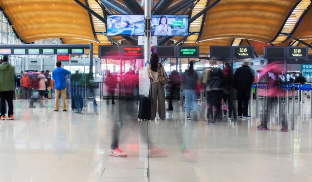 A view using blurred motion and double exposure techniques inside Hong Kong Boundary Crossing Facilities by Michael Kistler, who says he likes to look for usual ways to present everyday things and locations. Photo: Michael Kistler