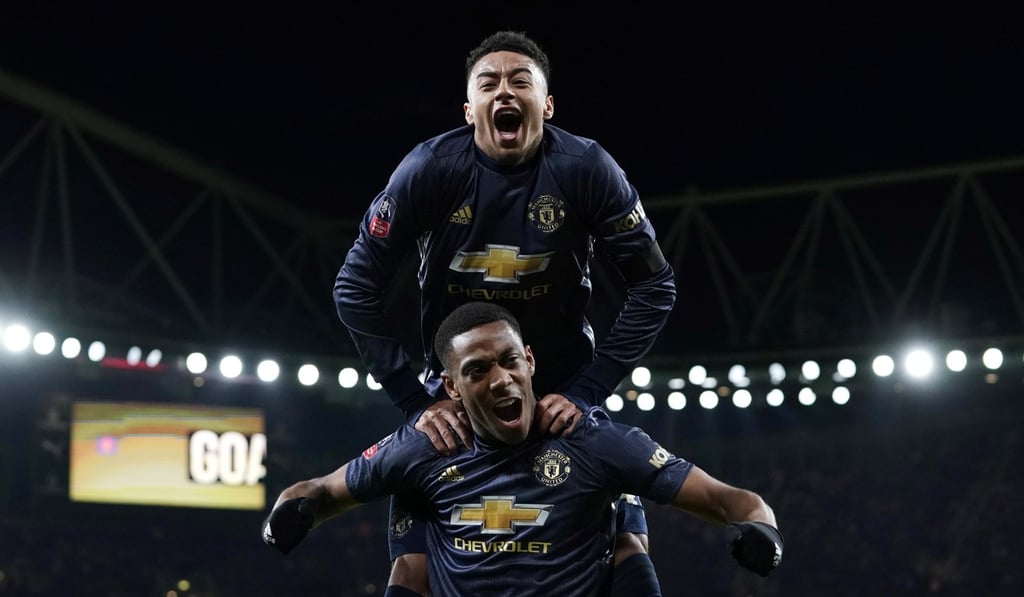 Anthony Martial celebrates with Jesse Lingard after scoring Manchester United’s third goal against Arsenal in the FA Cup. Photo: EPA Anthony Martial celebrates with Jesse Lingard after scoring Manchester United’s third goal against Arsenal in the FA Cup. Photo: EPA