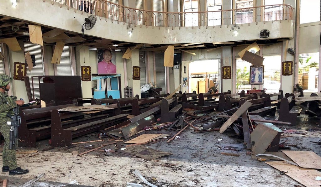 Inside the bomb-damaged church. Photo: AFP