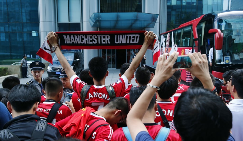 Manchester United fans gather outside the team hotel in Beijing in 2016. Photo: Reuters