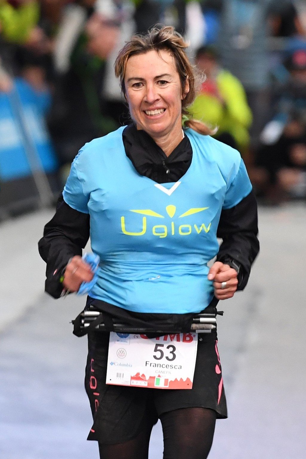 Francesca Canepa about to claim victory at the finish at the 171km UTMB. Photo: Agence France-Presse