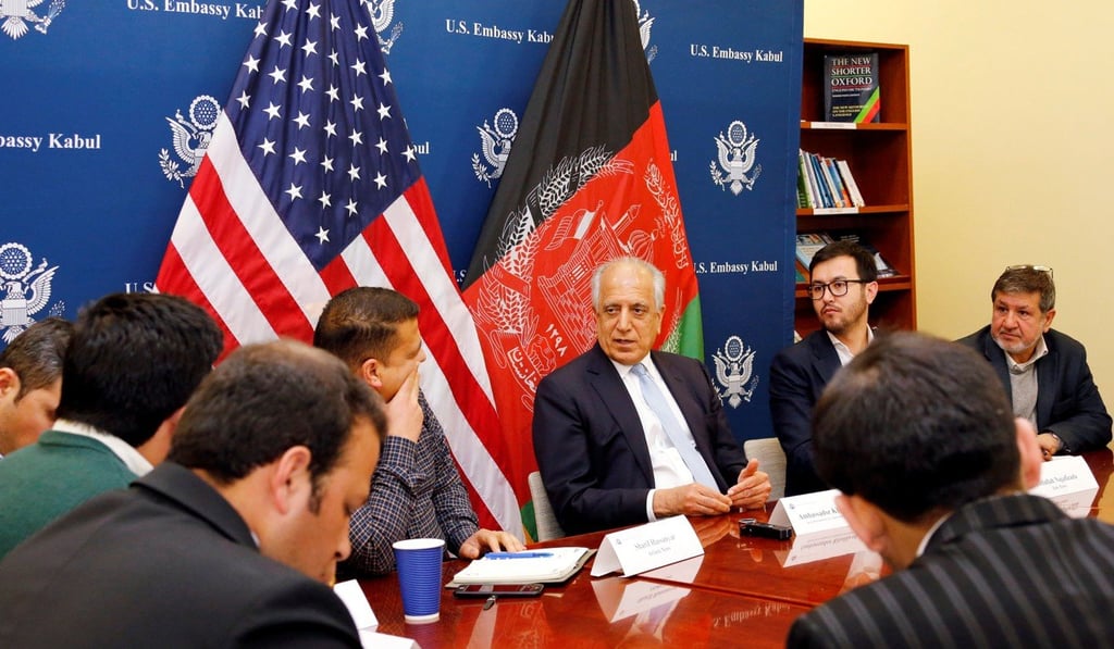 Khalilzad, centre, speaking with the Afghan news media in Kabul on Monday. Photo: Reuters