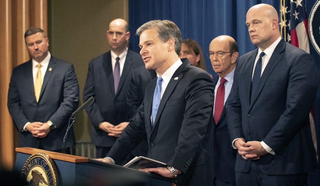 FBI director Christopher Wray speaks at a press conference announcing an indictment against Huawei on Monday. Photo: Bloomberg FBI director Christopher Wray speaks at a press conference announcing an indictment against Huawei on Monday. Photo: Bloomberg