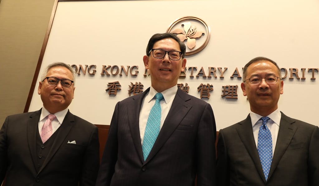(From left) Francis Chu, chief operating officer of the Exchange Fund Investment Office; Norman Chan Tak-lam, chief executive of the Hong Kong Monetary Authority; and Eddie Yue, CEO of the Exchange Fund Investment Office, at a press conference in Central to announce the performance of Exchange Fund in 2018. Photo: K. Y. Cheng