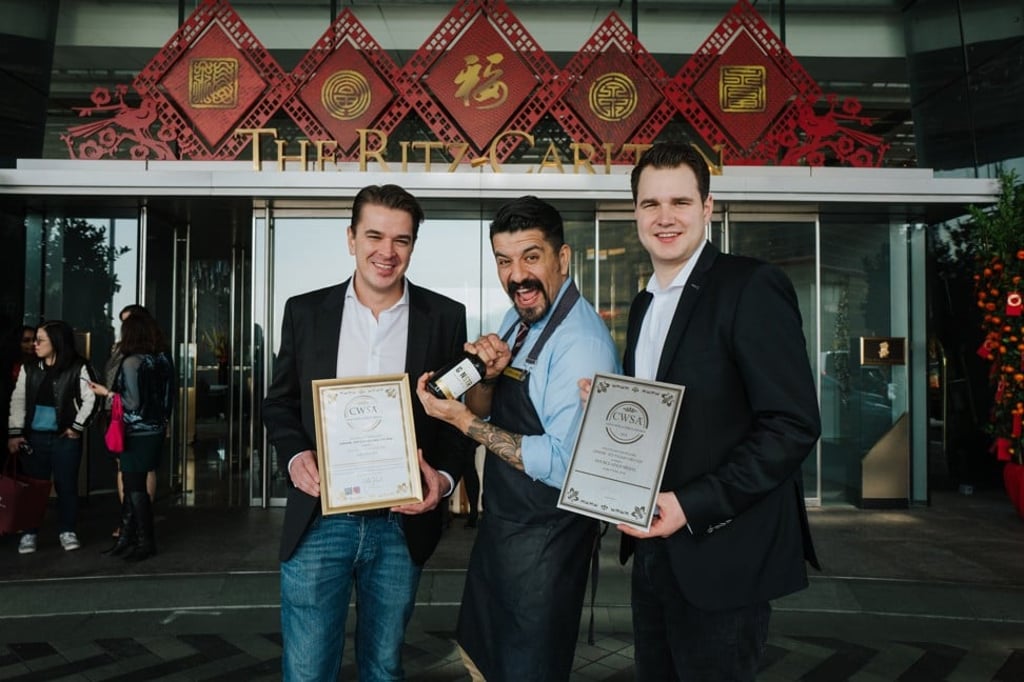 Alex & Markus from GINSTR with the Ritz-Carlton Hotel Hong Kong’s bar manager Oscar Mena. Photo: GINSTR