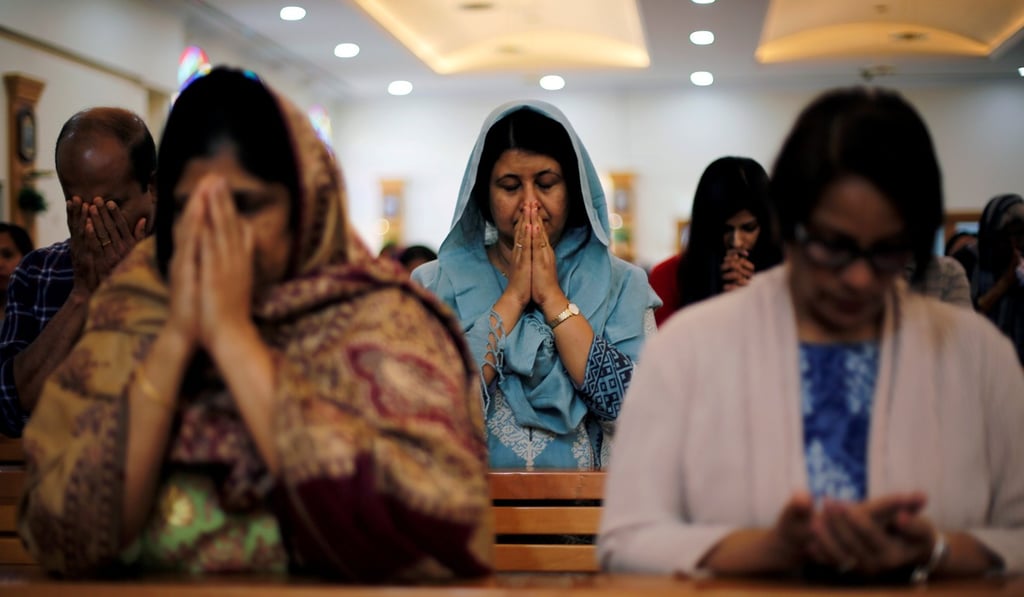 Expat worshippers pray during the mass at St. Francis of Assisi Catholic Church in Jebel Ali, as Catholics in the Gulf are awaiting a historical visit by Pope Francis to United Arab Emirates. Photo: Reuters