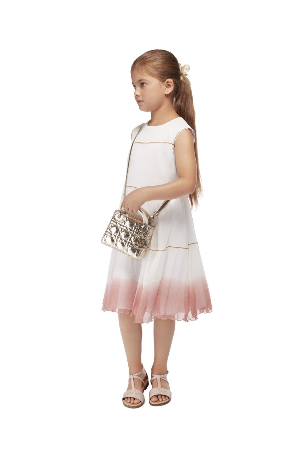 Dior’s gold bag is ideal for your child to store their lai see.