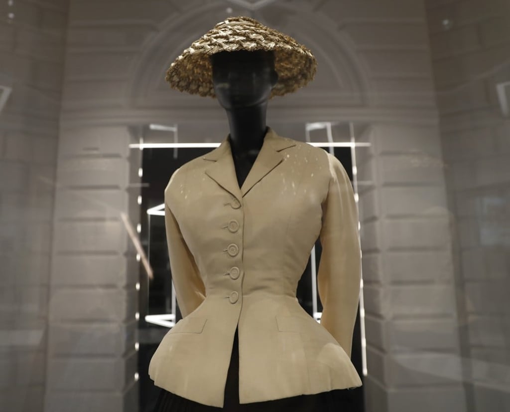 Dior’s iconic bar suit and hat is made from silk, wool taffeta and straw, design by Christian Dior, Haute couture spring/summer 1947. Photo: AP Dior’s iconic bar suit and hat is made from silk, wool taffeta and straw, design by Christian Dior, Haute couture spring/summer 1947. Photo: AP