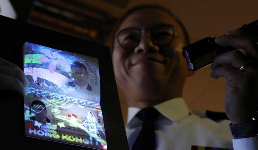 The new passport will sport decorative designs on the biodata page, visible under UV light. Photo: Winson Wong
