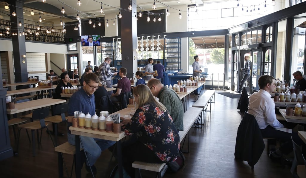 Customers dine at the Wursthall Restaurant & Bierhaus in San Mateo. Photo: AP