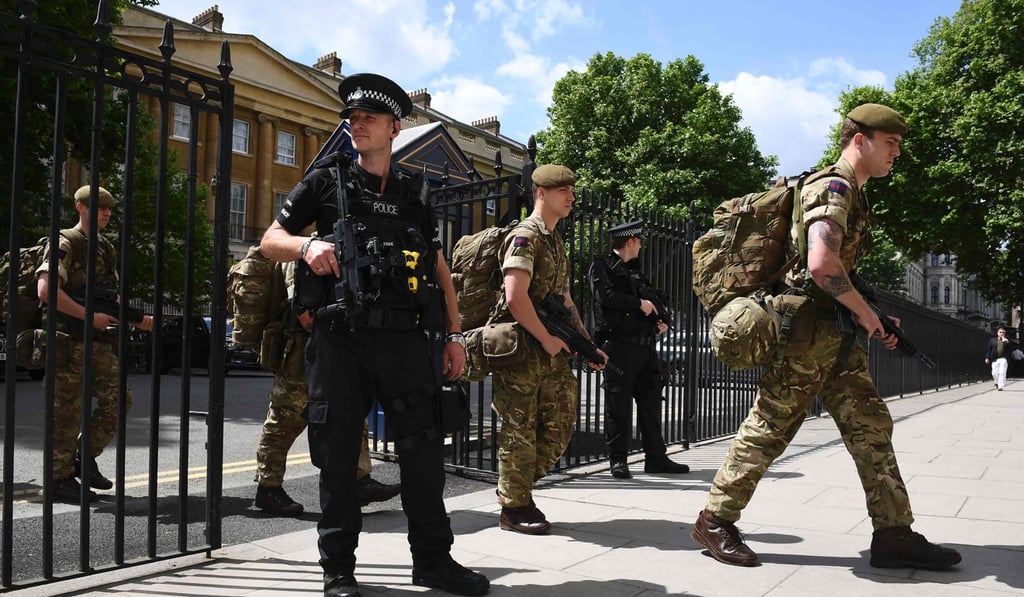 British soldiers enter a Ministry of Defence building near to New Scotland Yard police headquarters. File photo: AFP