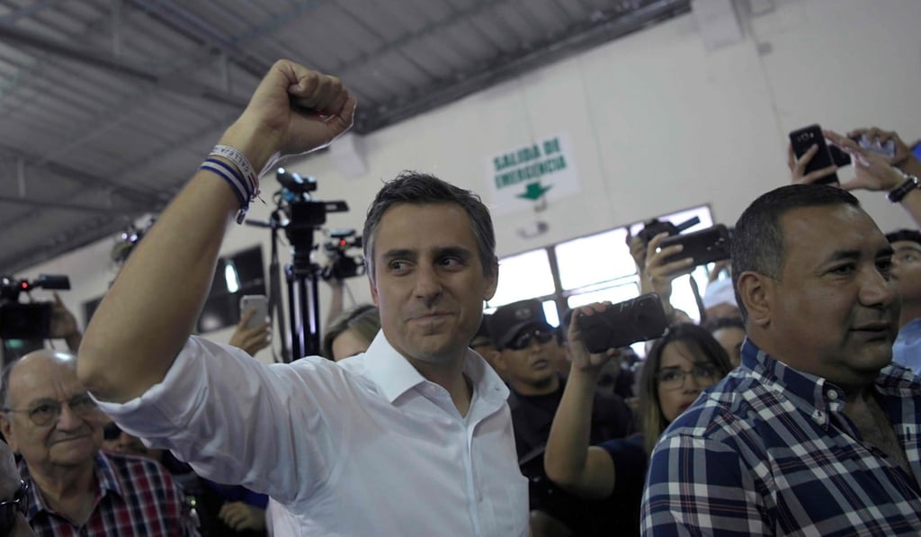 Salvadorean presidential candidate Carlos Calleja, of the National Republican Alliance (ARENA), gestures at a polling station during the Salvadorean presidential election. Photo: AFP