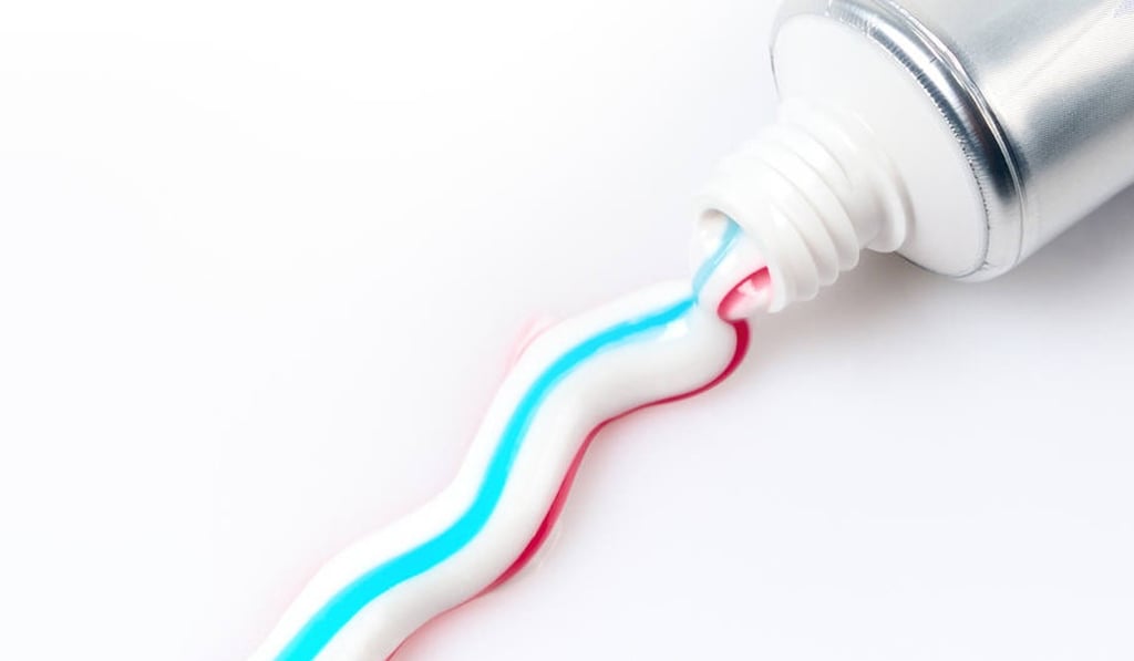 Children who use too much toothpaste risk dental fluorosis, white marks and discolouration of teeth. Photo: Shutterstock