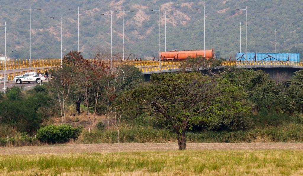 The Venezuela military blocked the bridge with a truck tanker and a huge shipping container. Photo: AP